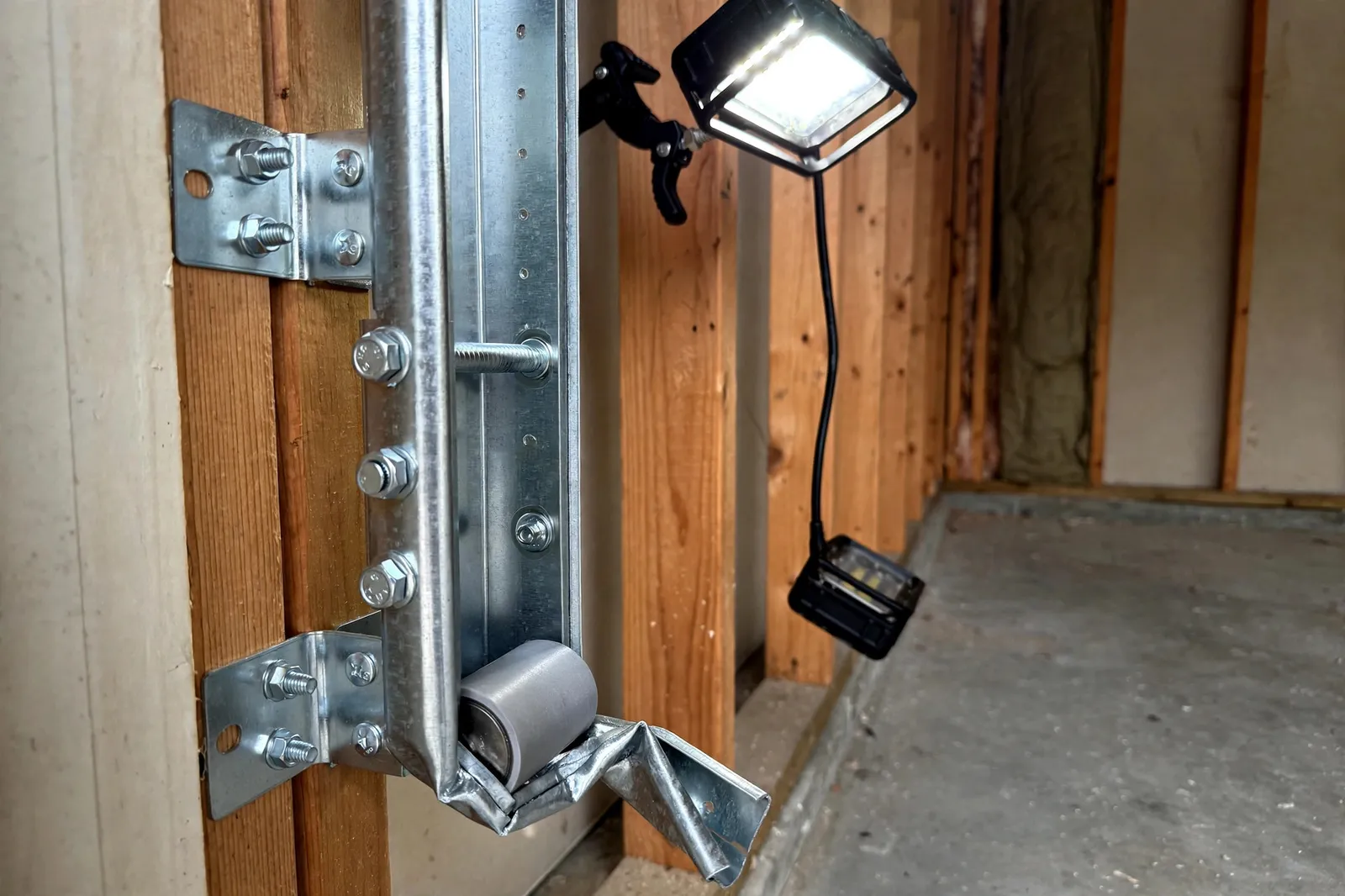 Before photo,  Clipped Track Repair in Wakefield, by Waldorf Garage Door Repair